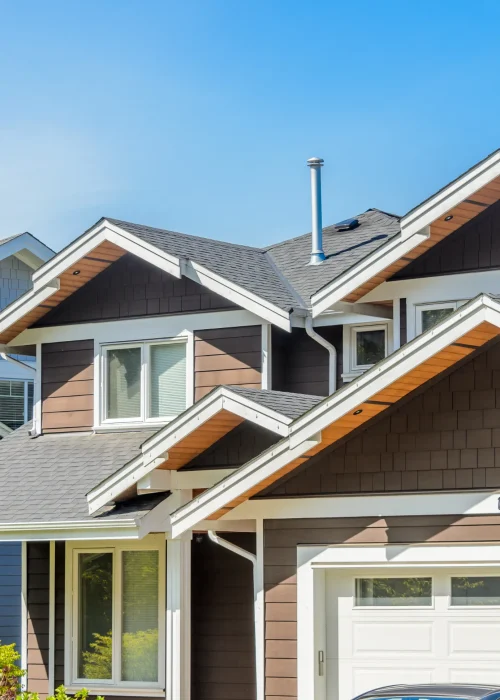 A suburban house with a neat and beautiful roof.